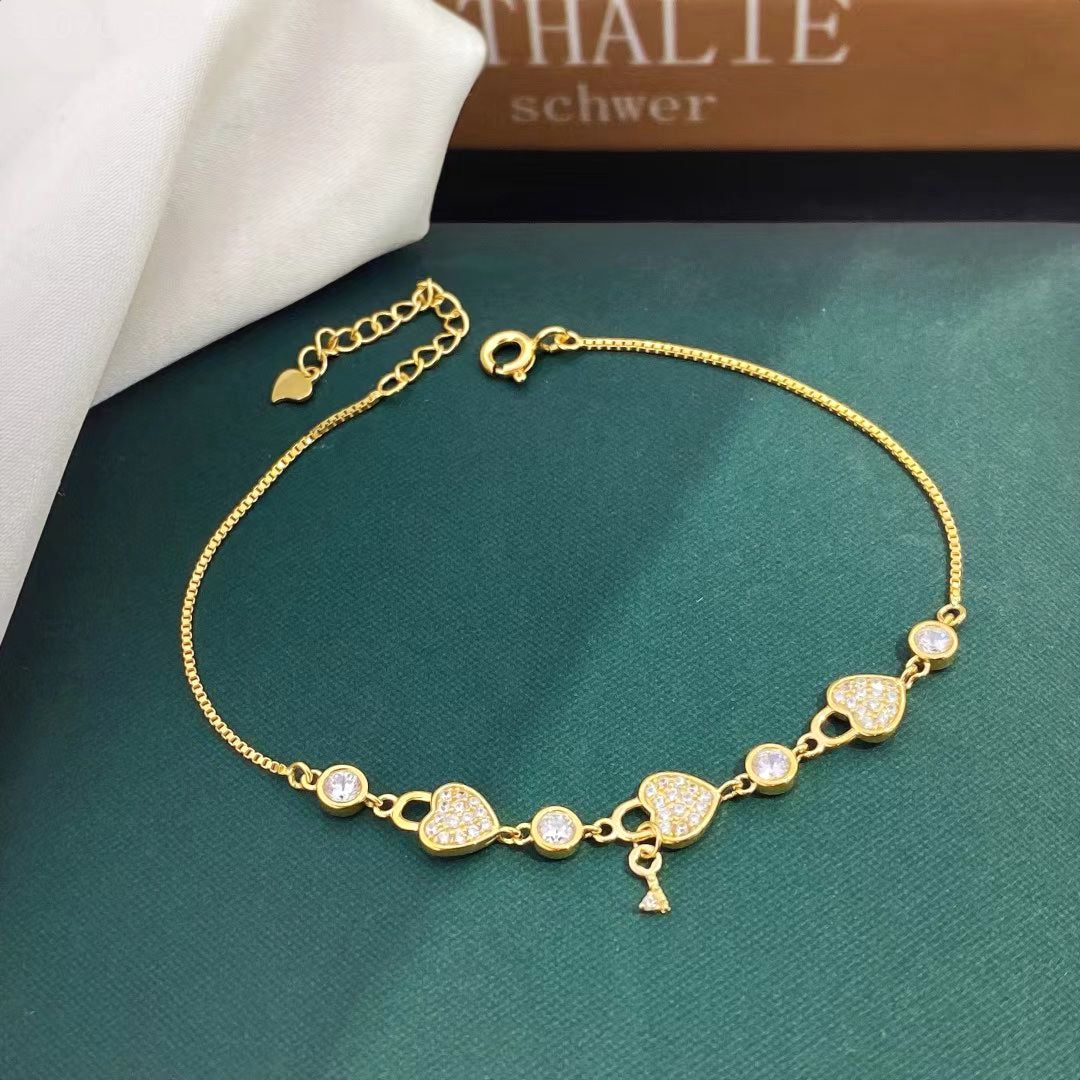 Heart-Themed Gold-Plated Sterling Silver Bracelet with Cubic