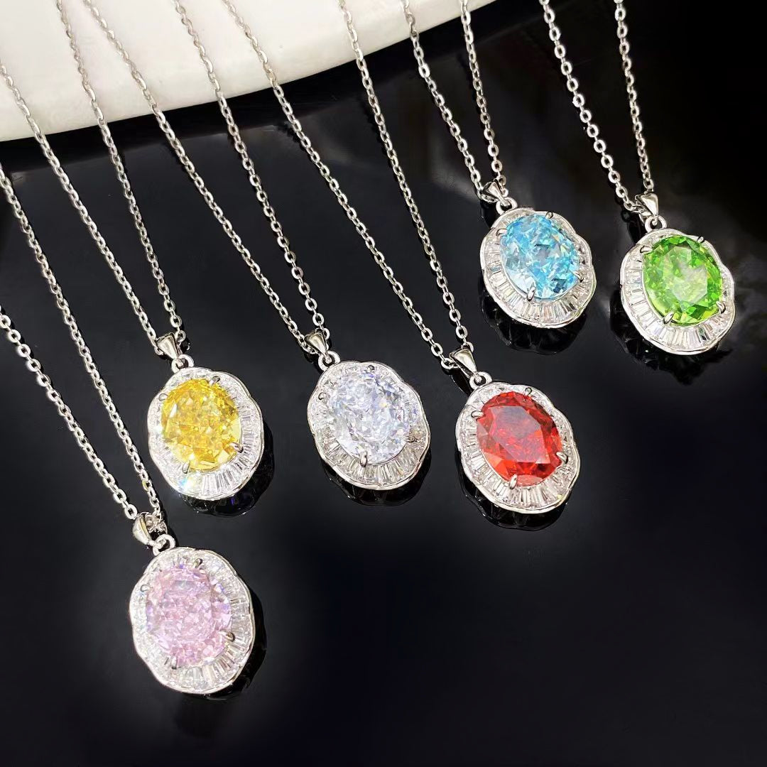 This elegant sterling silver necklace features a stunning garnet colour nano gemstone, known for its exceptional brilliance and rich hue. The oval pendant is beautifully framed by sparkling cubic zirconia and finished with sophisticated rhodium plating, making it a standout piece for any jewellery collection.