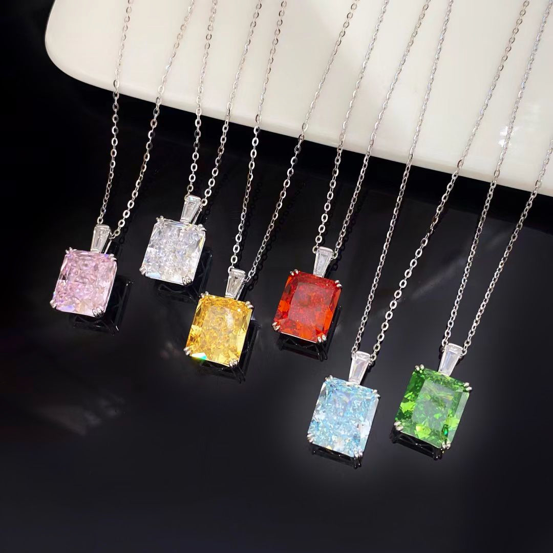 This elegant sterling silver necklace features a stunning sky blue nano crystal, renowned for its exceptional brilliance and vibrant hue. The rectangular pendant is beautifully framed by a sophisticated rhodium plating, making it a standout piece for any jewellery collection.