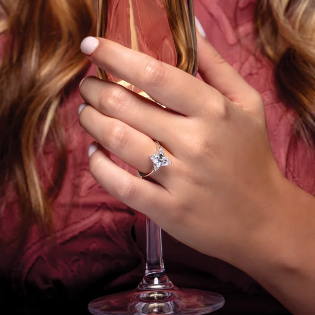 1.42ctw Marquise and Pear Shape Moissanite Three Stone Engagement Ring