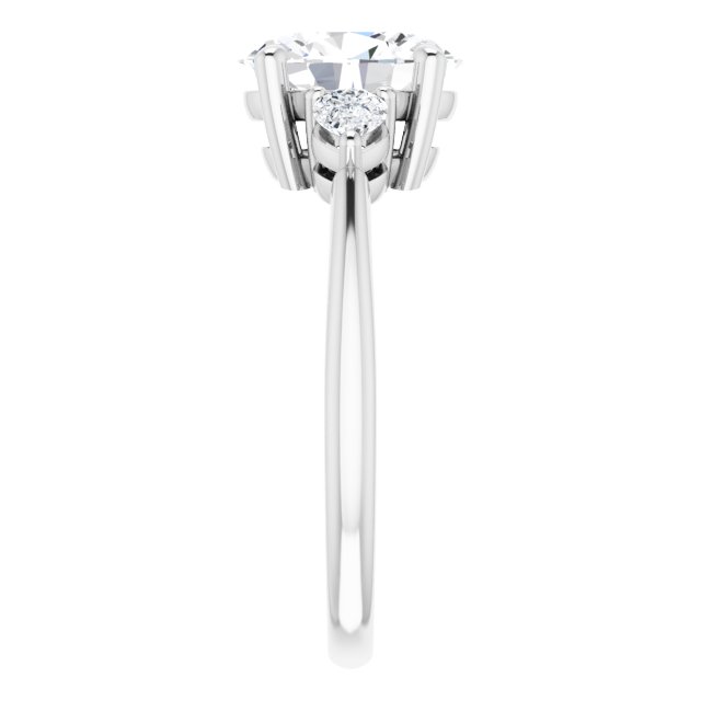 Two Carat Oval Brilliant and Pear Moissanite Three Stone Engagement Ring