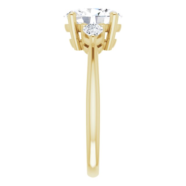 Two Carat Oval Brilliant and Pear Moissanite Three Stone Engagement Ring