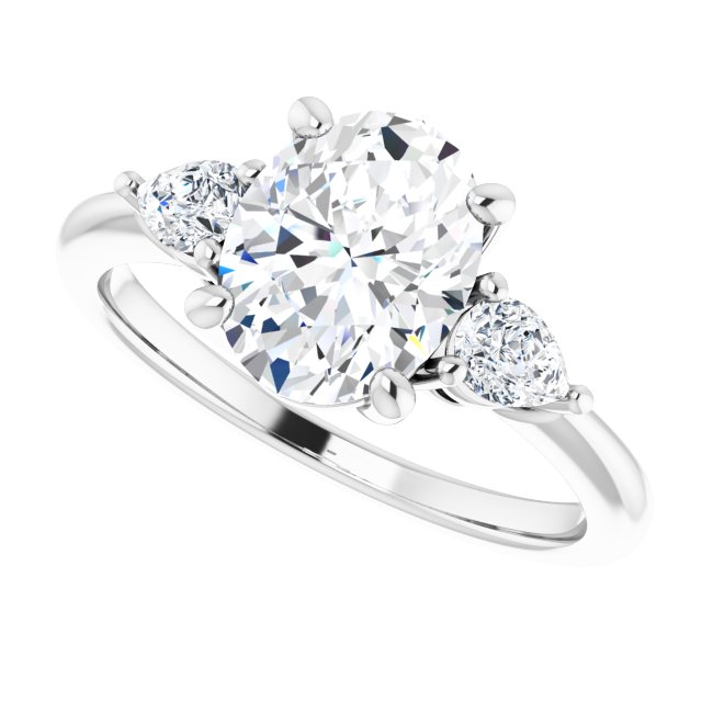 Two Carat Oval Brilliant and Pear Moissanite Three Stone Engagement Ring