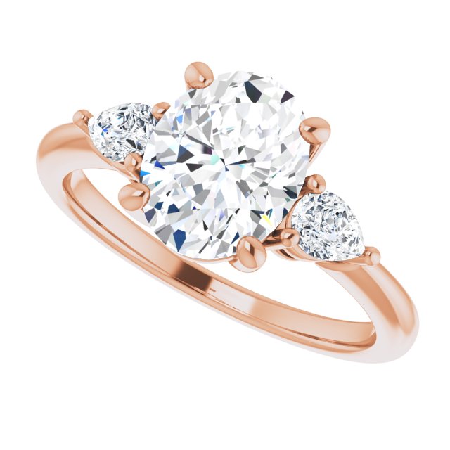 Two Carat Oval Brilliant and Pear Moissanite Three Stone Engagement Ring