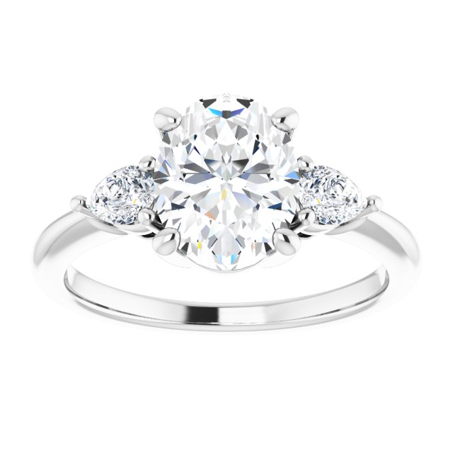 Two Carat Oval Brilliant and Pear Moissanite Three Stone Engagement Ring