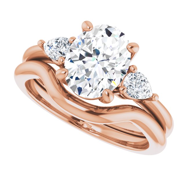 Two Carat Oval Brilliant and Pear Moissanite Three Stone Engagement Ring
