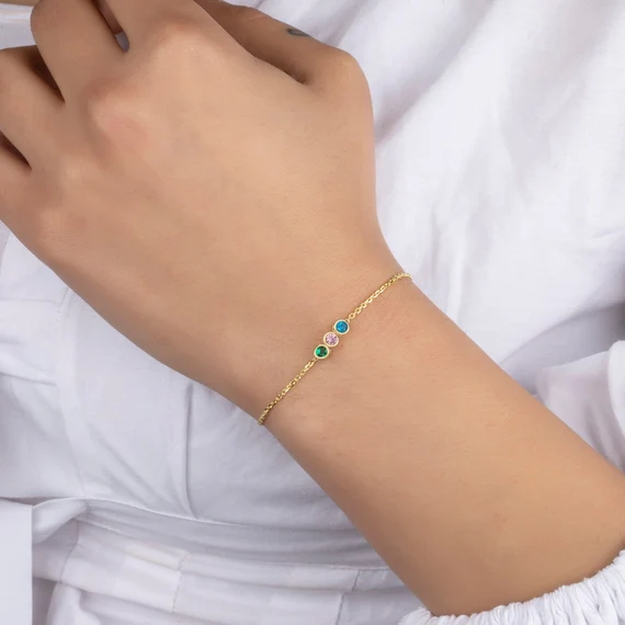 a collection of bracelets that you can set with birthstones for a meaningful and memorable gift
