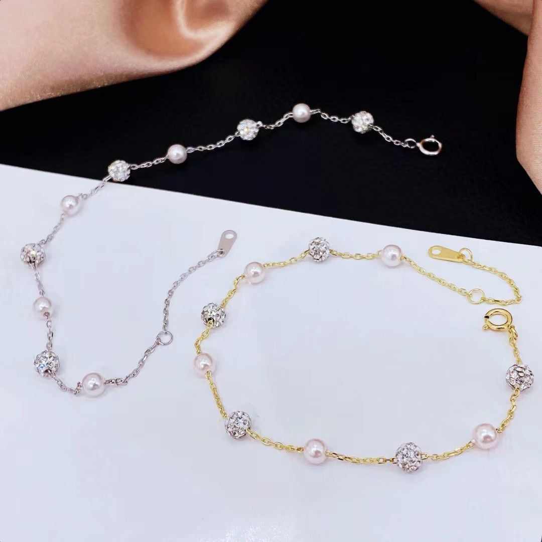 Sterling Silver Pearl and CZ Bracelet  This piece effortlessly blends classic elegance with modern sophistication