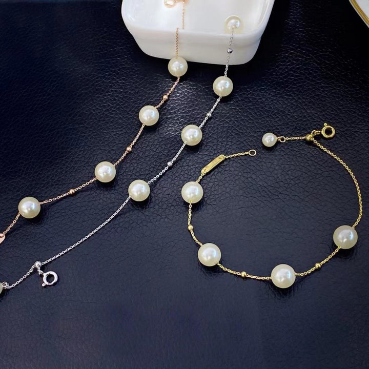 This elegant sterling silver bracelet features lustrous shell pearls set along a delicate chain. The rose gold plating adds a warm, sophisticated touch and helps prevent tarnishing, ensuring lasting beauty.
