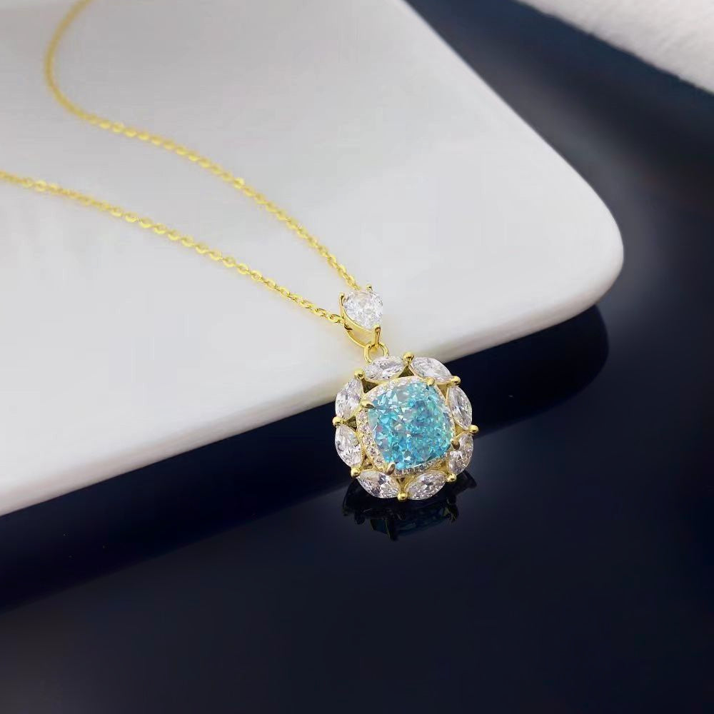 This exquisite sterling silver necklace features a brilliant sky blue nano crystal, renowned for its captivating sparkle and vivid colour. The pendant is beautifully framed by marquise-cut cubic zirconia and finished with luxurious gold plating, creating an elegant and timeless piece for any jewellery collection.