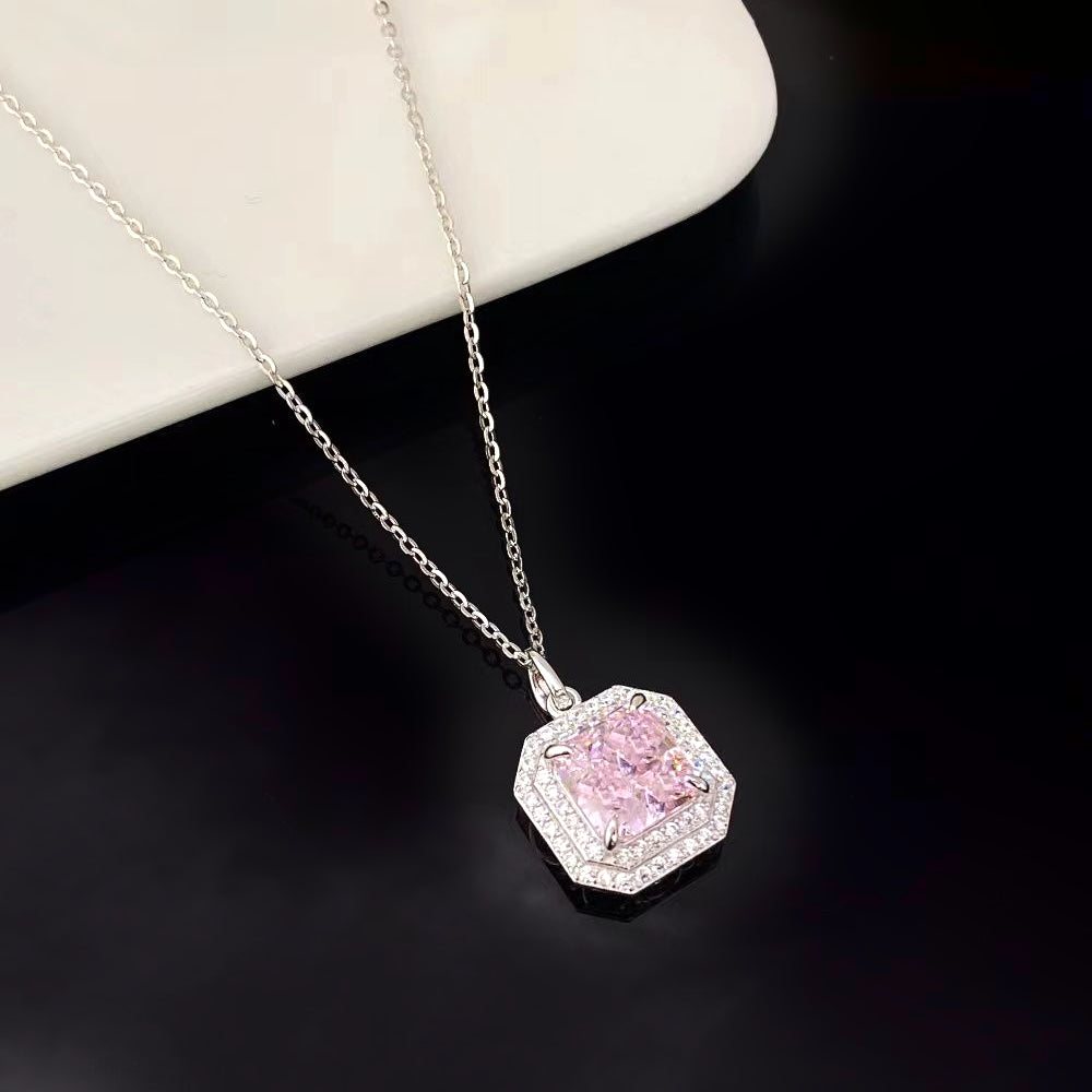 This sterling silver necklace features a stunning pink nano crystal, celebrated for its brilliant sparkle and vibrant hue. The octagonal pendant is elegantly framed by dazzling cubic zirconia and finished with a sophisticated rhodium plating, adding a touch of contemporary elegance to any jewellery collection.