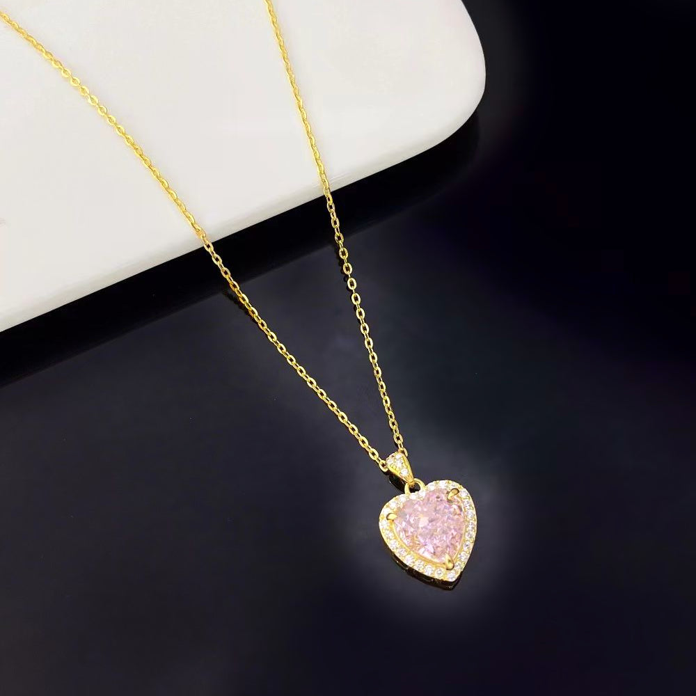 This delightful sterling silver necklace features a heart-shaped pink nano crystal, admired for its exquisite sparkle and vibrant colour. Encircled by glistening cubic zirconia and finished with elegant gold plating, this pendant adds a touch of romance and sophistication to any jewellery collection.