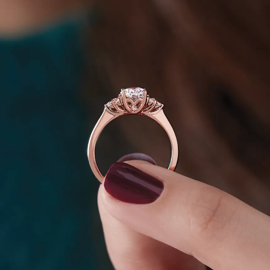 A woman holding a ring