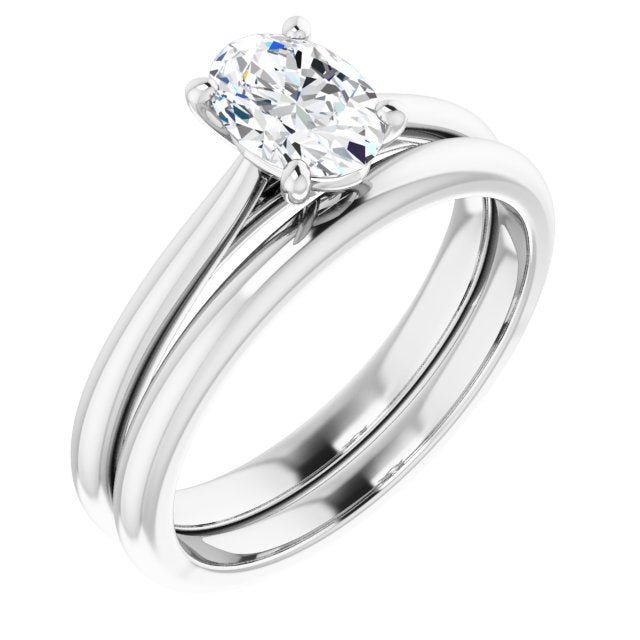 Oval moissanite engagement ring with matching wedding band
